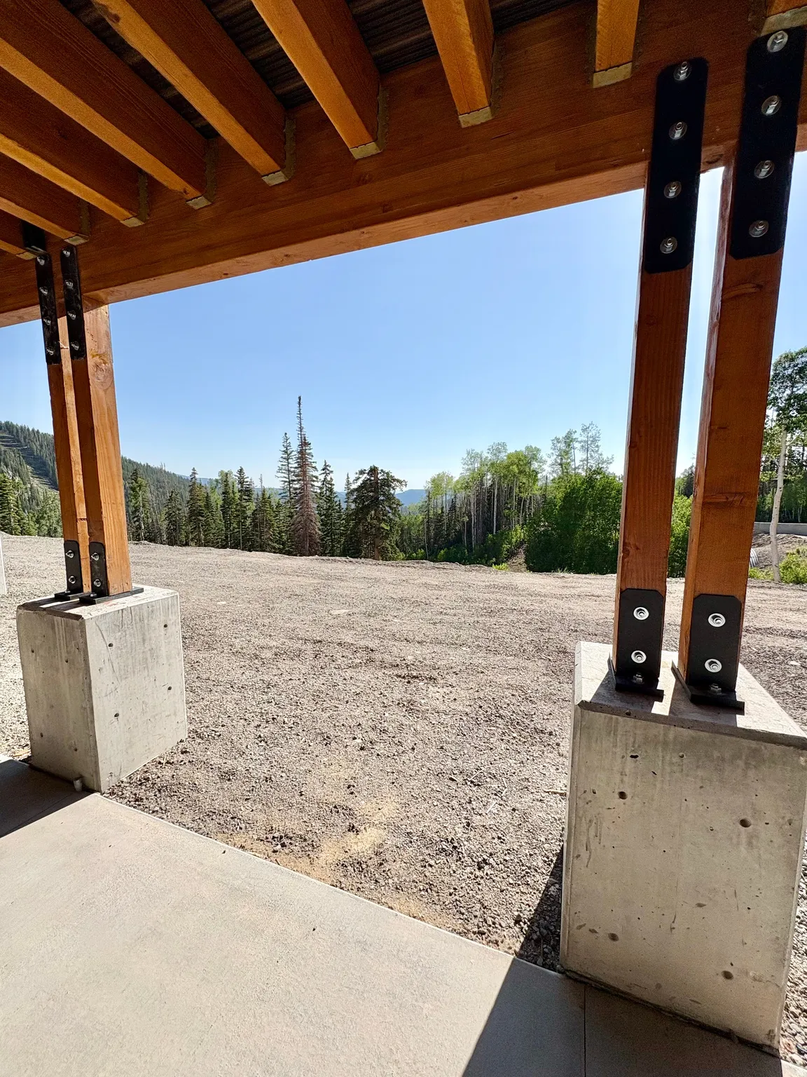 View of yard with elevator and a patio