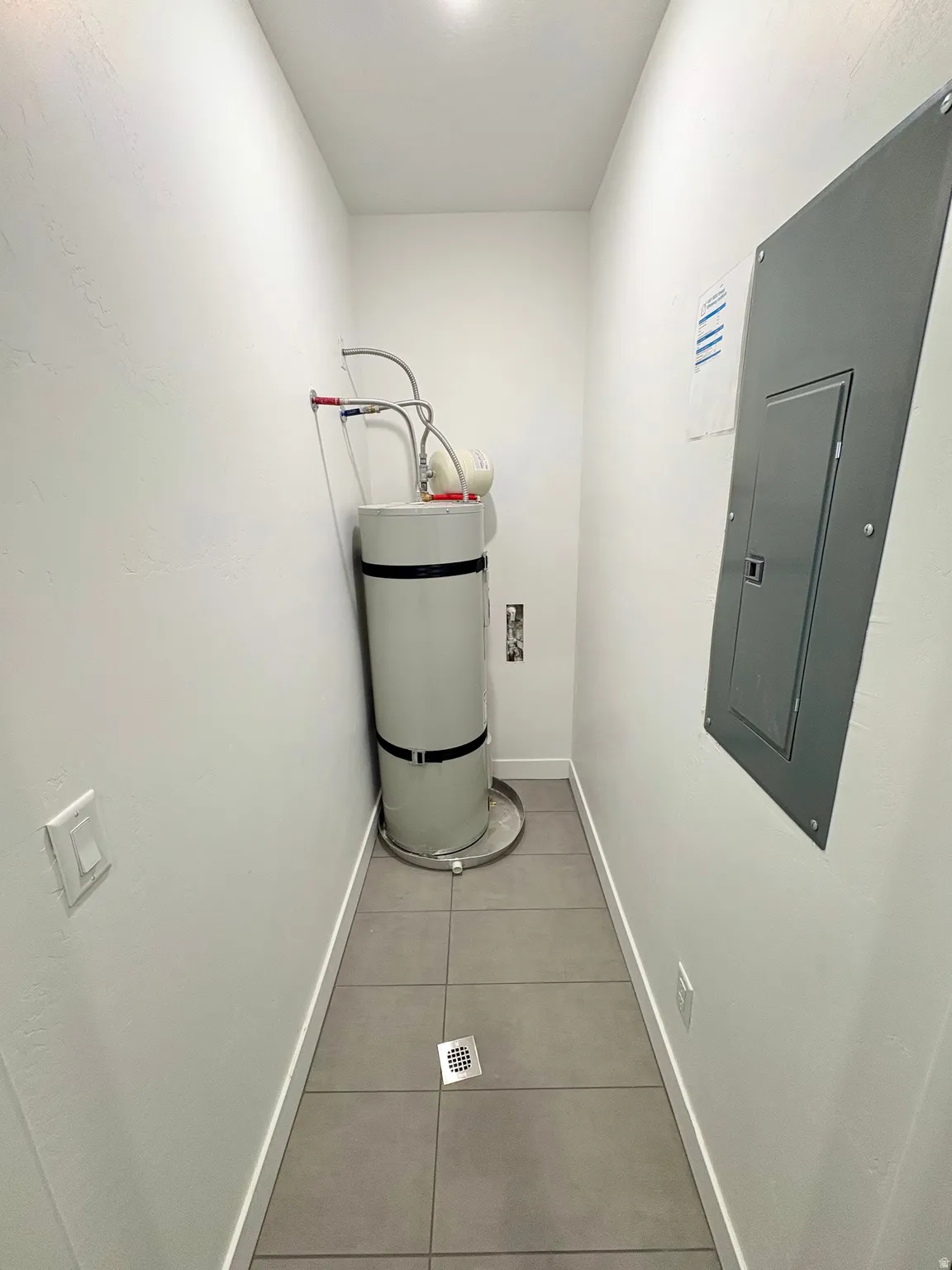 Utility room featuring electric panel