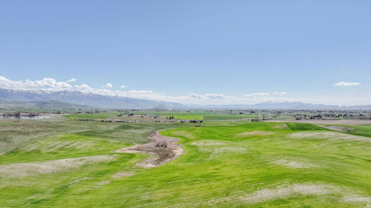 View of property's community with a mountain view and golf course view