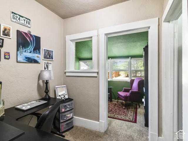 Interior space featuring neutral wall tones and white trim