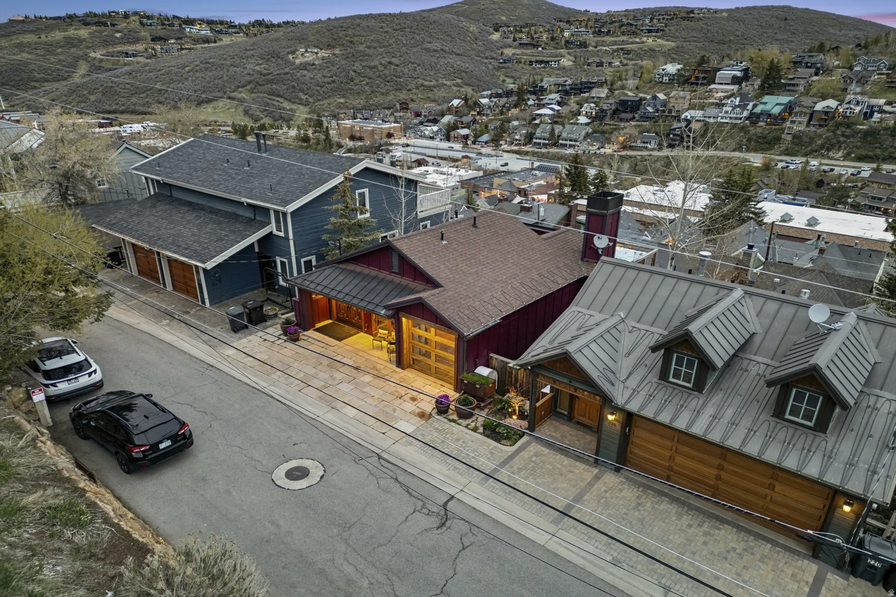 Aerial view of residential area featuring mountains