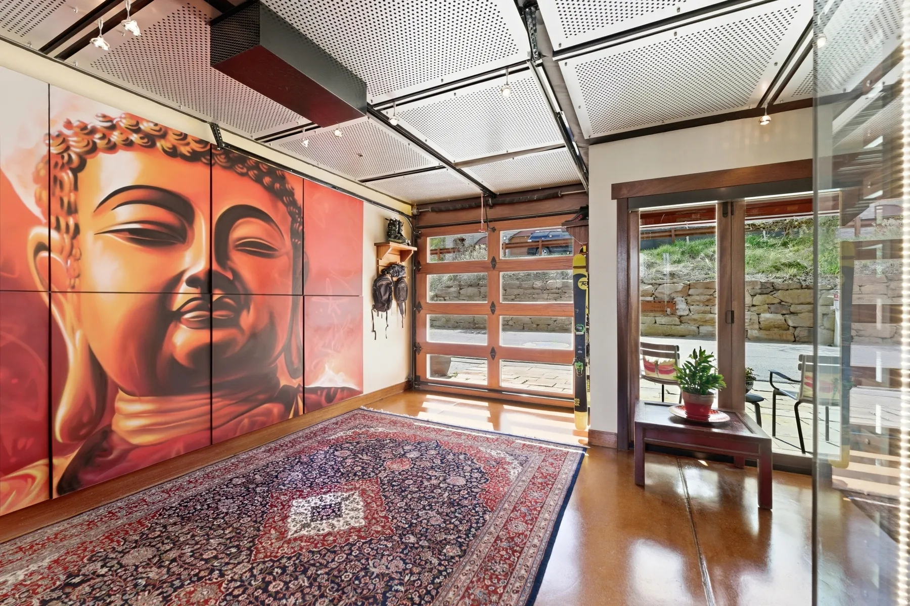 Sunroom featuring french doors and healthy amount of natural light