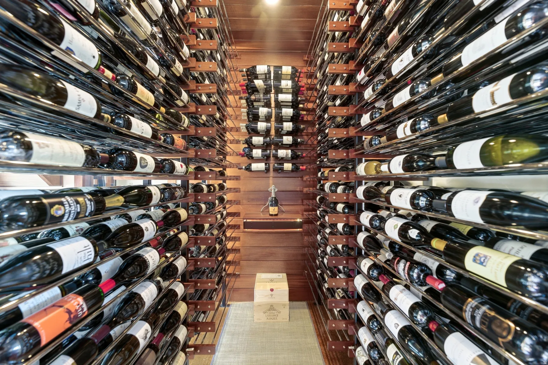 Wine cellar featuring wood ceiling