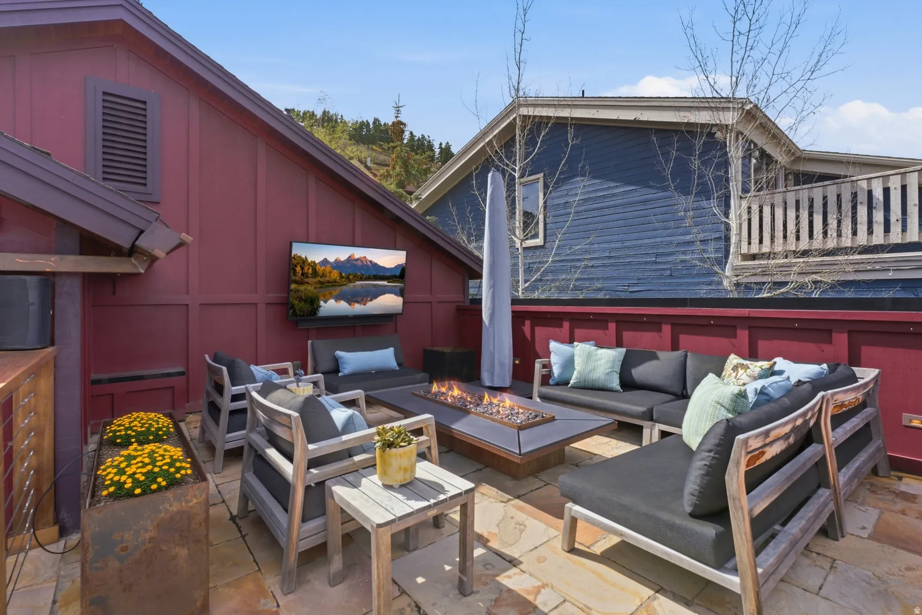 View of patio / terrace with an outdoor living space with a fire pit