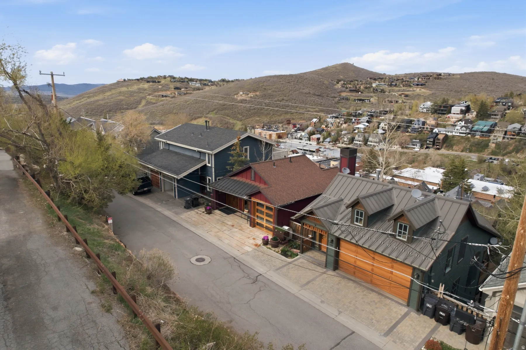 Aerial view of residential area with a mountainous background