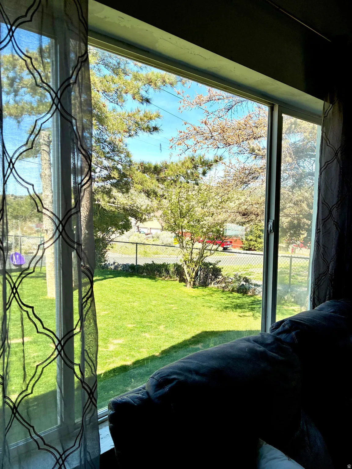 Interior space featuring access to outside and multiple windows