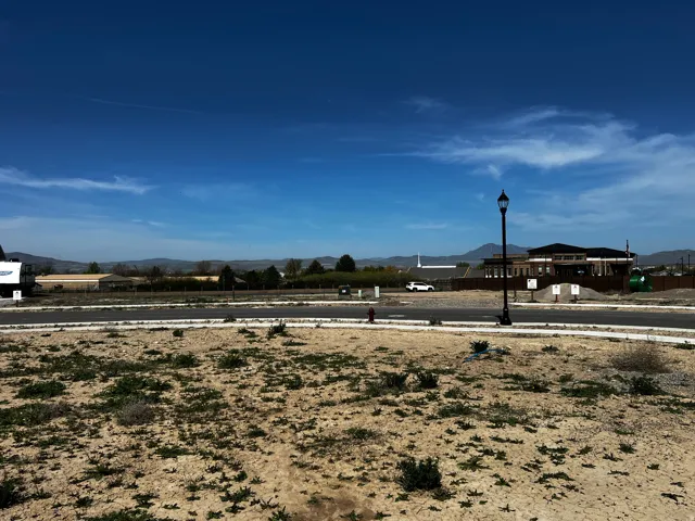 View of yard with a mountain view