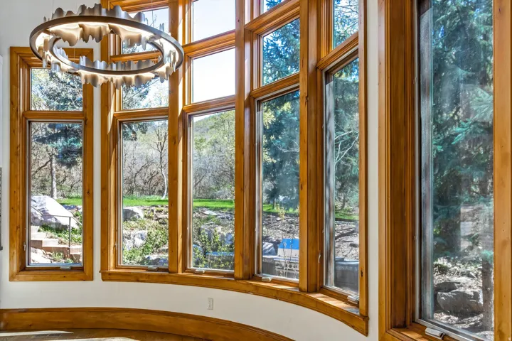 Unfurnished sunroom with a chandelier