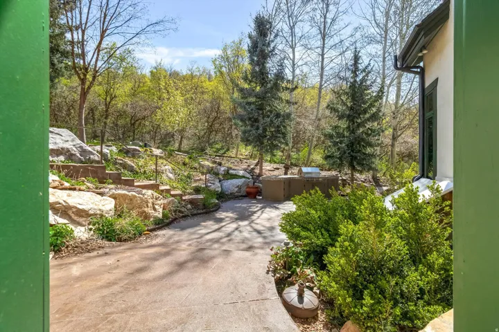 Designed for entertaining, the back yard offers many seating areas.