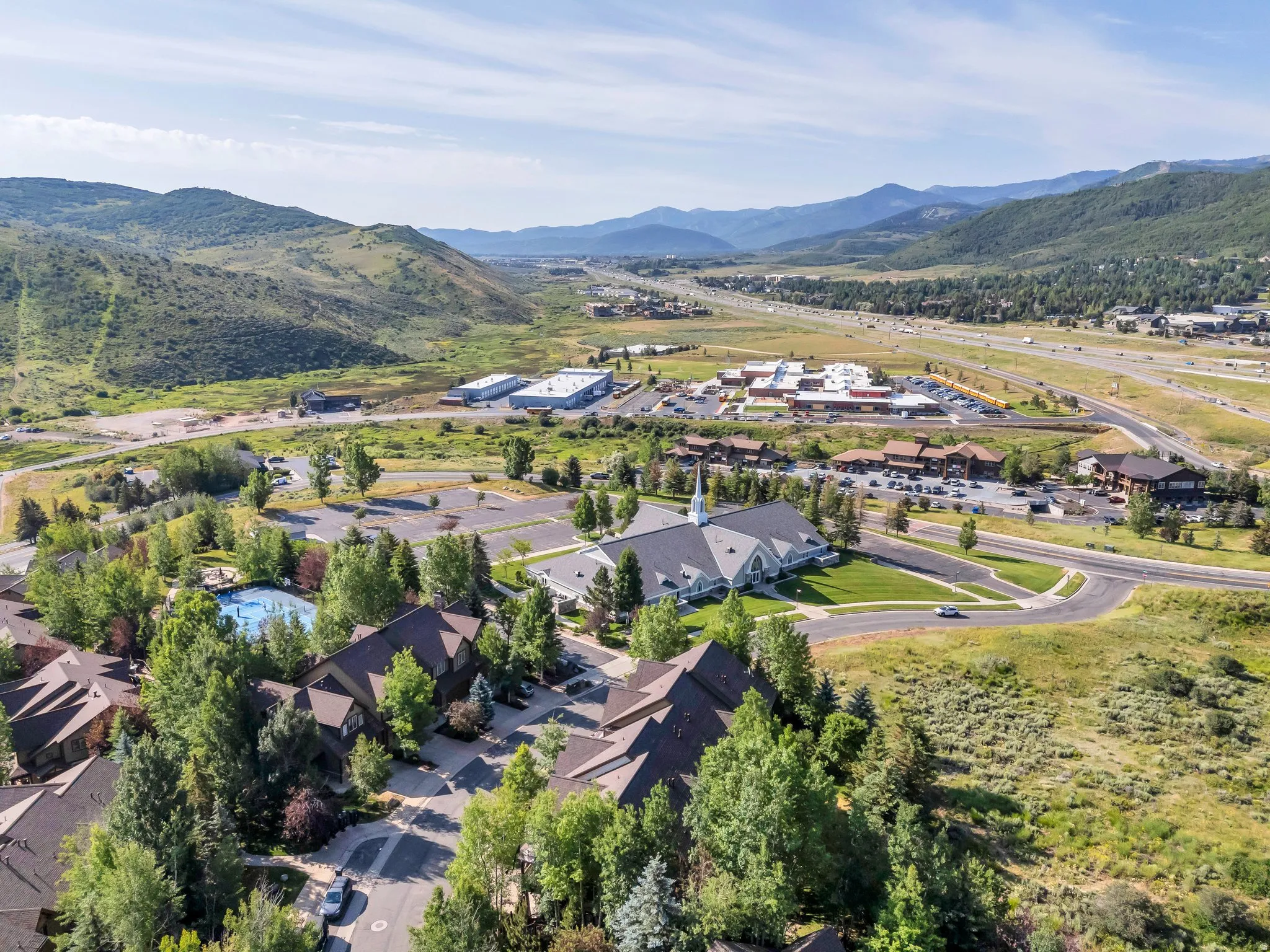 Aerial view of residential area with a mountain backdrop
