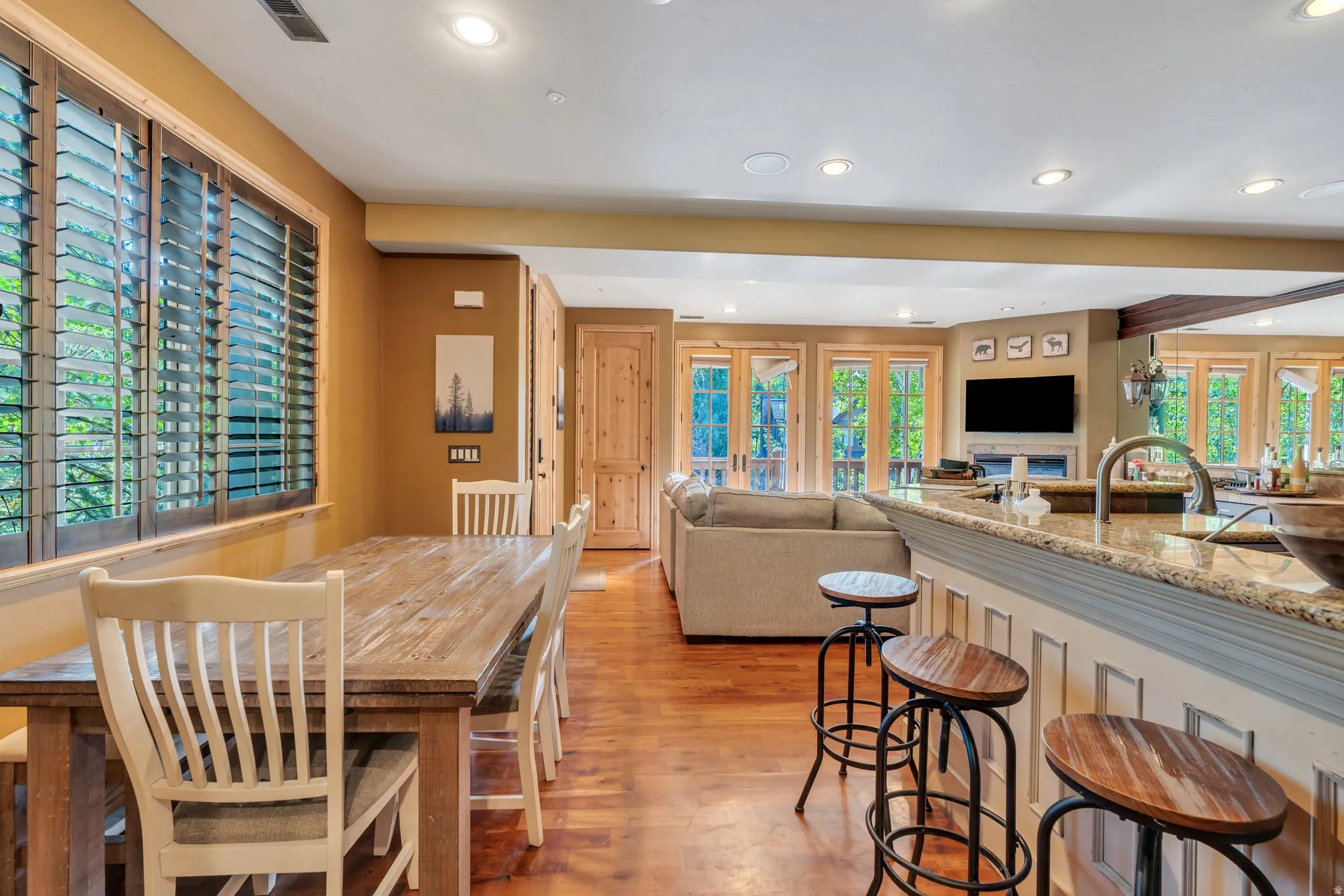 Dining room featuring recessed lighting and light wood-type flooring