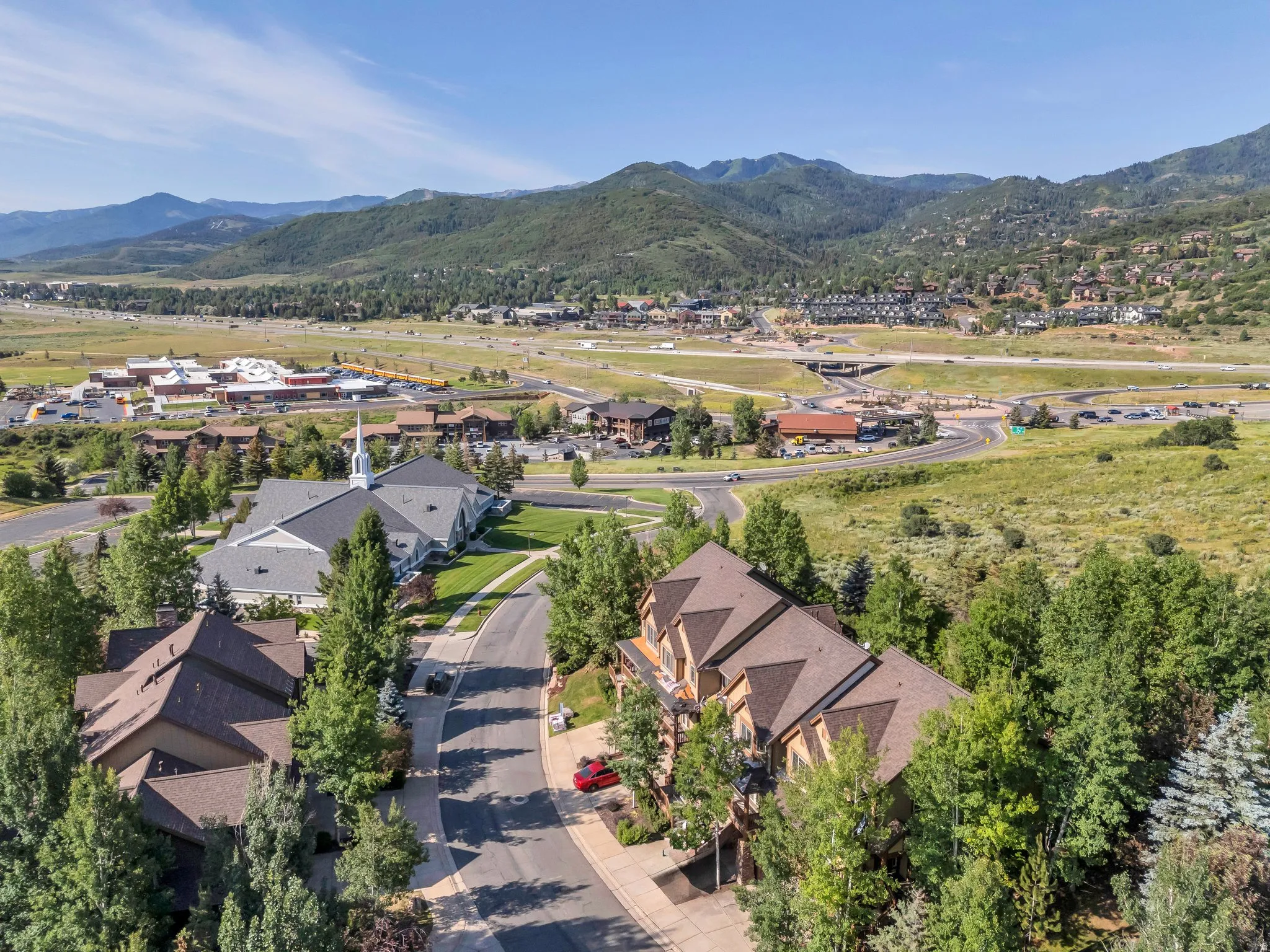 Aerial perspective of suburban area featuring mountains