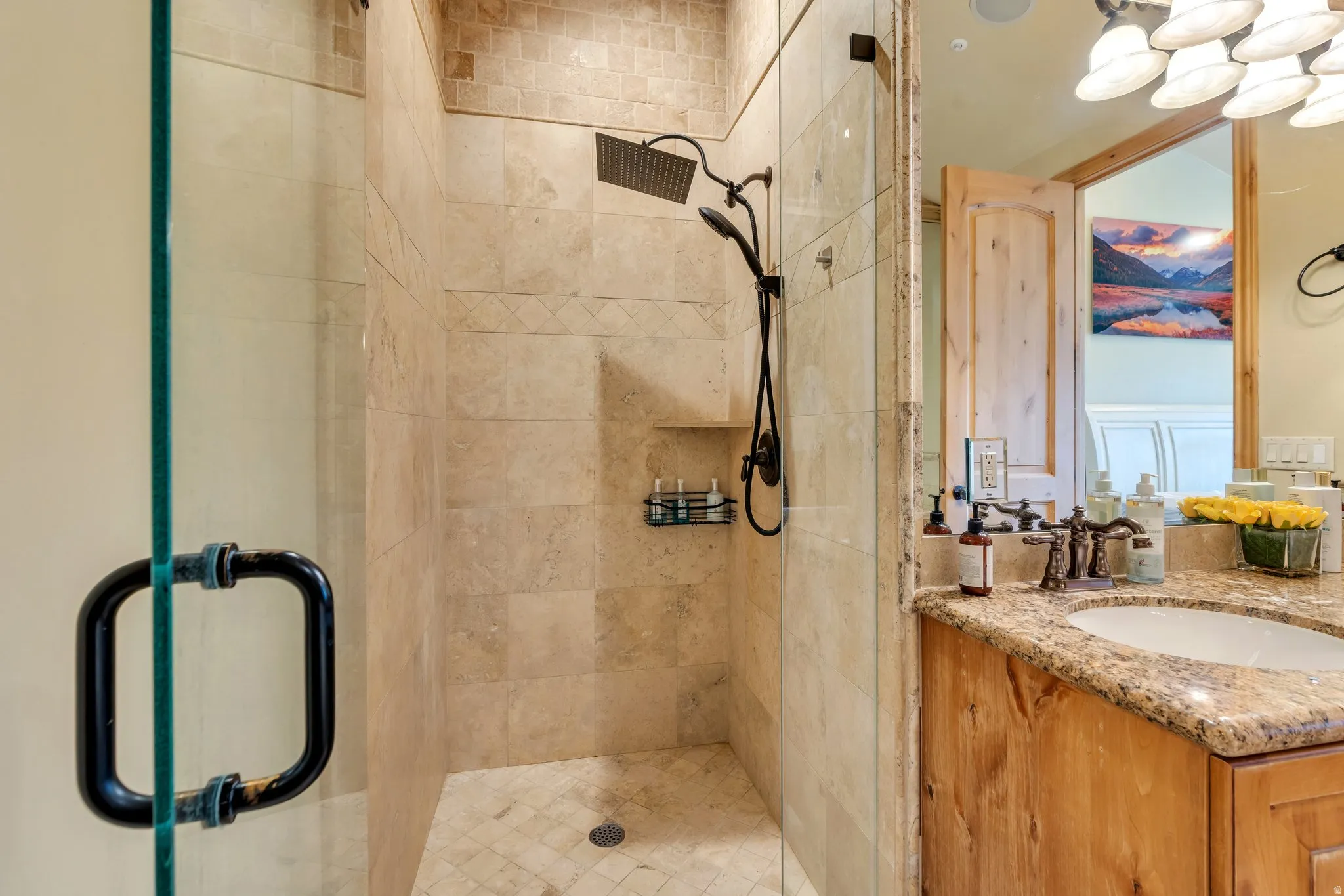 Full bath featuring vanity and a shower stall