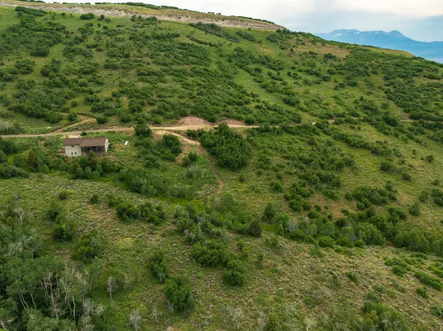 Drone / aerial view of a mountainous background