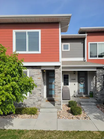 View of front of house with stone siding