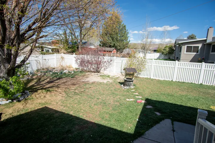 View of fenced backyard