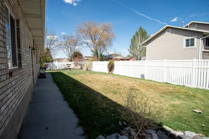 View of fenced backyard