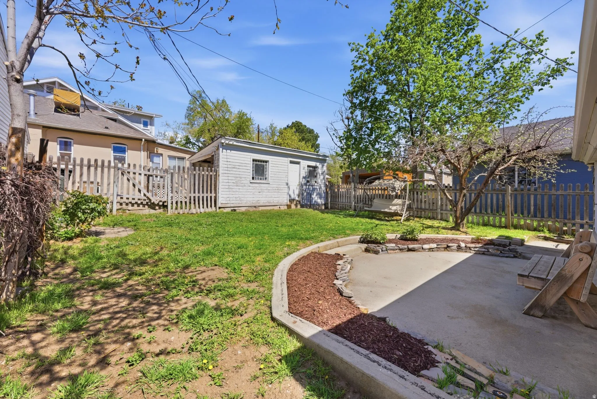 Fenced backyard featuring a patio area