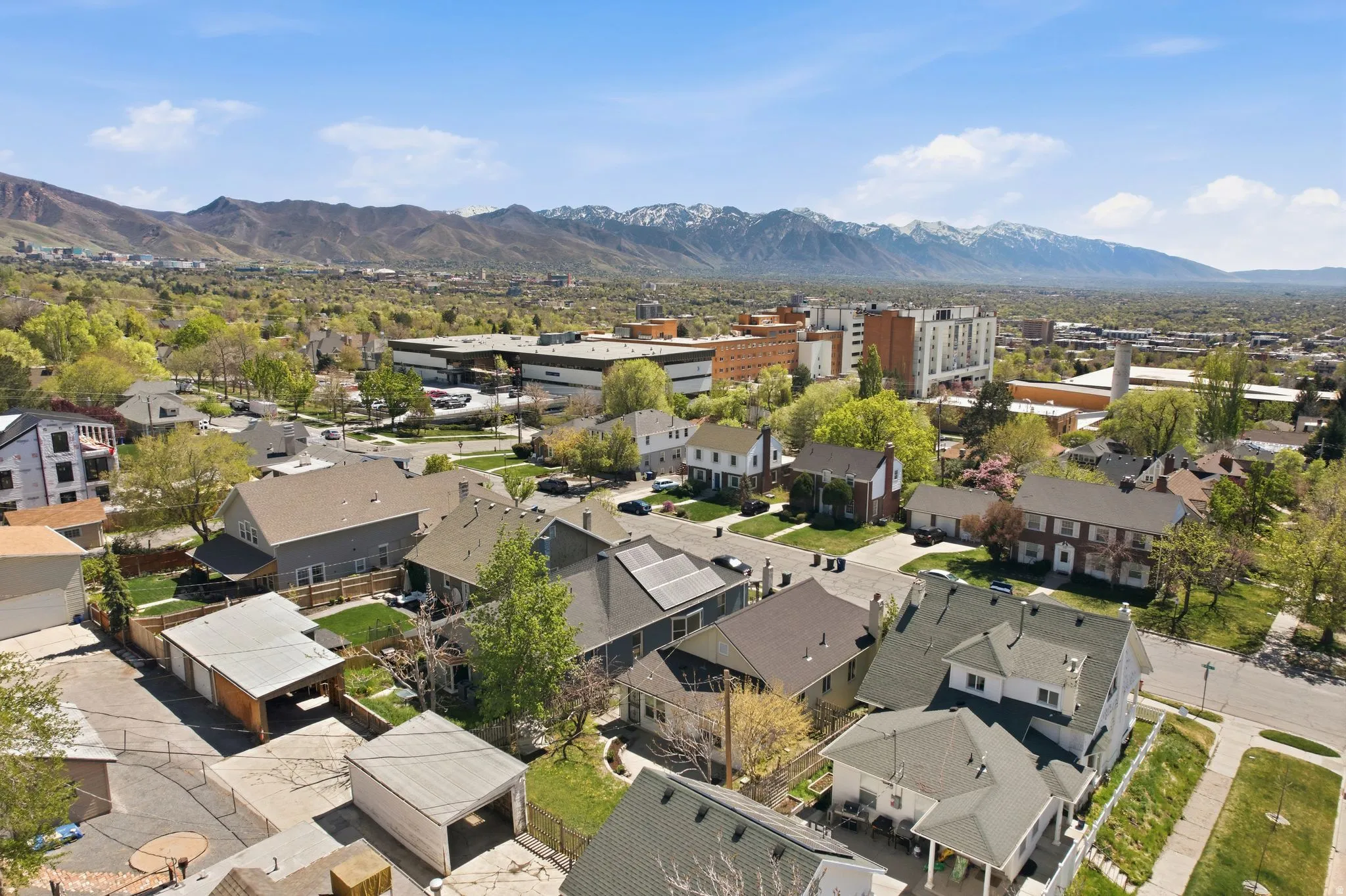 Aerial perspective of suburban area with mountains