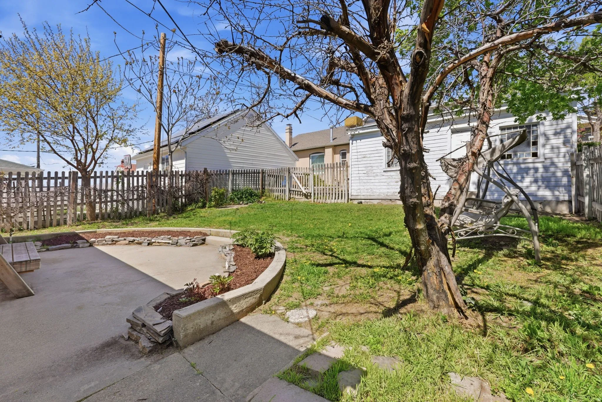 Fenced backyard featuring a patio area