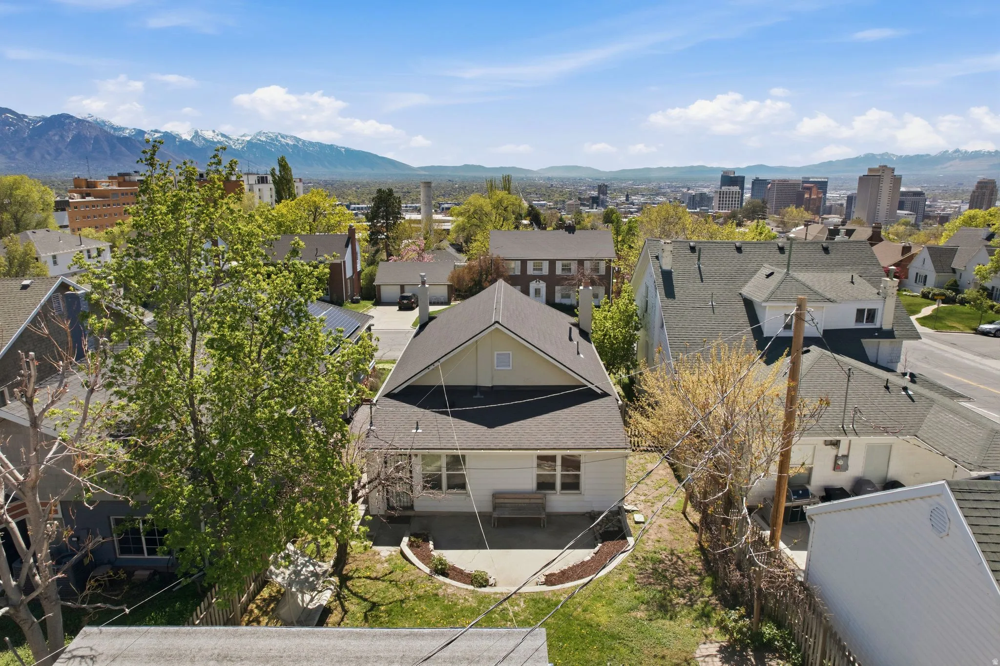 Aerial view of residential area featuring mountains