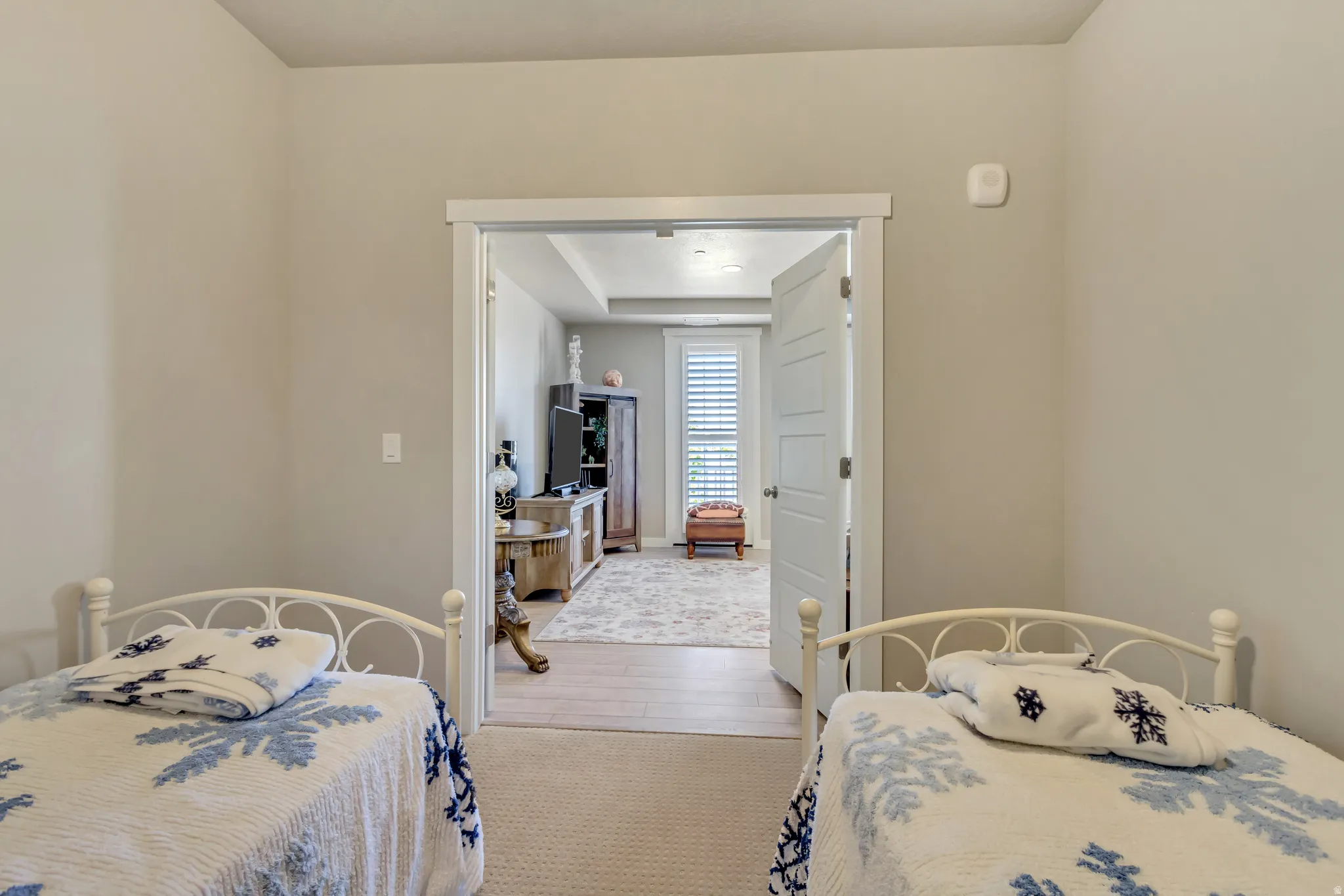 Bedroom with light wood-style floors