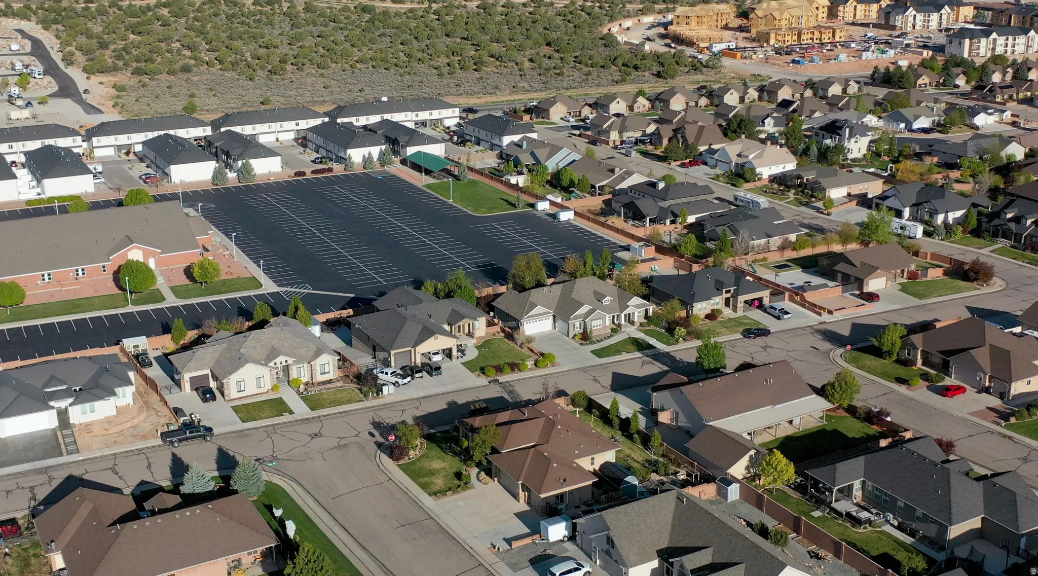 View of property location with nearby suburban area