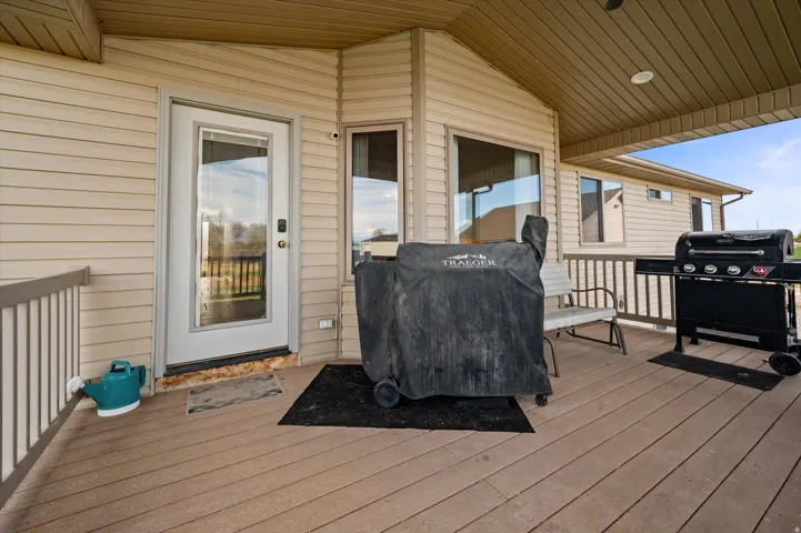 Deck featuring a grill
