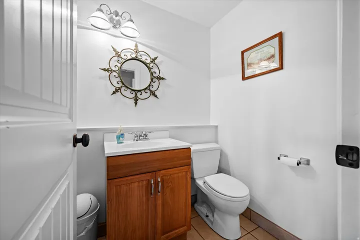 Bathroom with vanity and light tile patterned floors