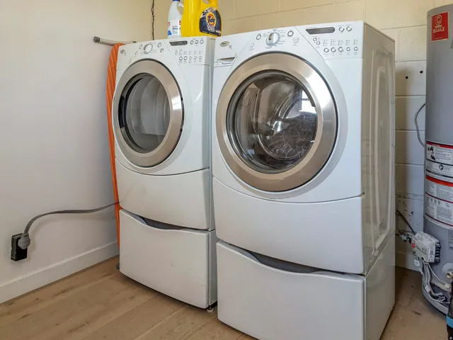 Combined laundry between unit 6 and 7 in building 3 (the duplex)