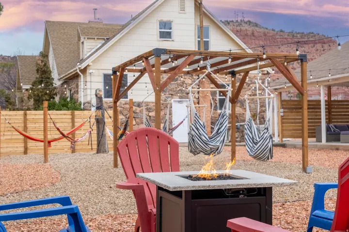 Our communal outdoor space includes: Views, fire pit, seating, cowboy pool, hammocks, hammock chairs, covered patio, BBQ, string lights on timers, wifi connectivity, pergolas, shades