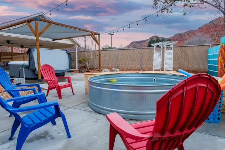 Our communal outdoor space includes: Views, fire pit, seating, cowboy pool, hammocks, hammock chairs, covered patio, BBQ, string lights on timers, wifi connectivity, pergolas, shades