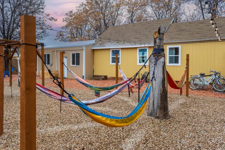 Our communal outdoor space includes: Views, fire pit, seating, cowboy pool, hammocks, hammock chairs, covered patio, BBQ, string lights on timers, wifi connectivity, pergolas, shades