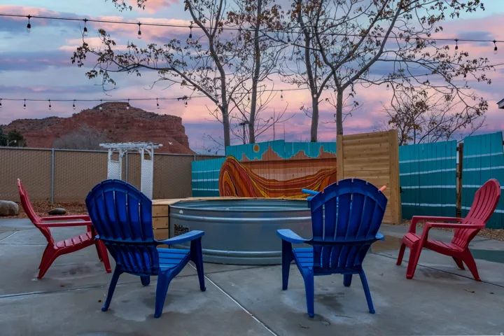 Our communal outdoor space includes: Views, fire pit, seating, cowboy pool, hammocks, hammock chairs, covered patio, BBQ, string lights on timers, wifi connectivity, pergolas, shades
