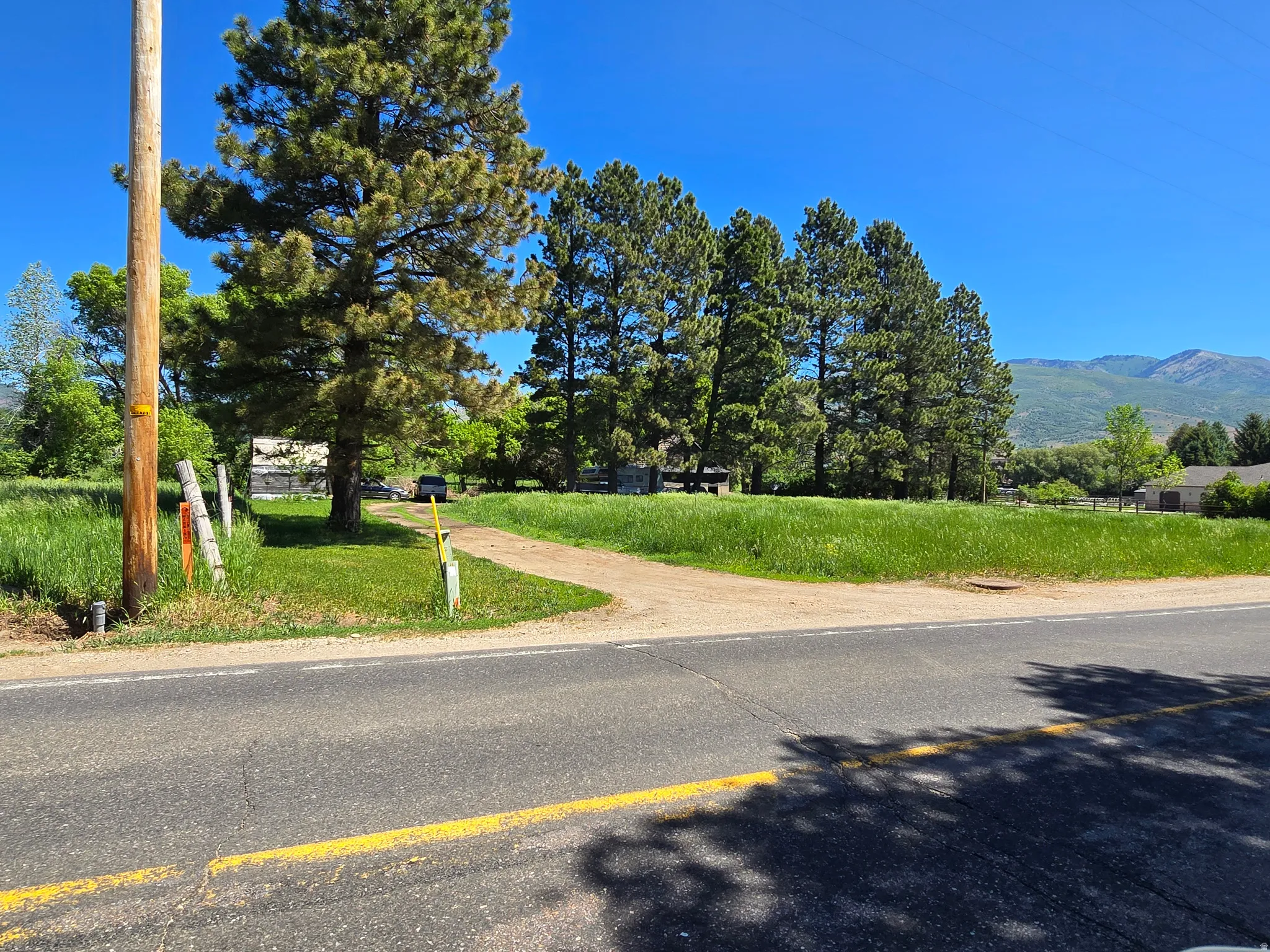 View of asphalt road with a mountain view