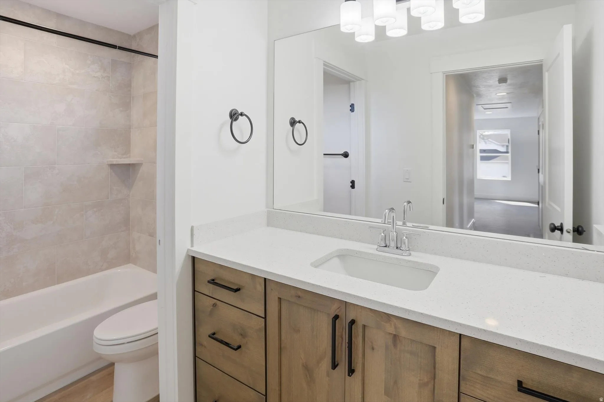 Full bathroom featuring vanity and shower / bathtub combination