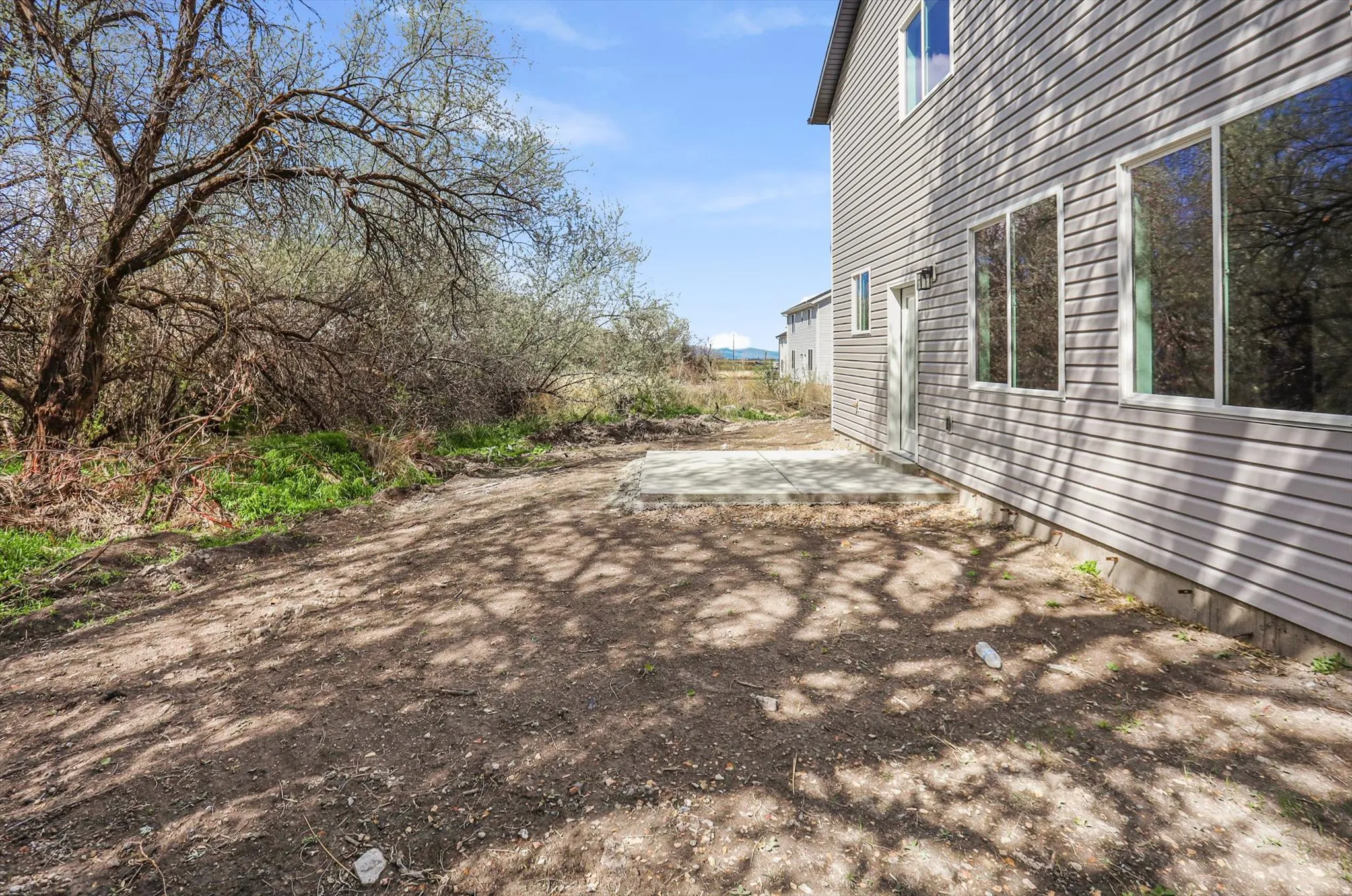 View of yard with a patio