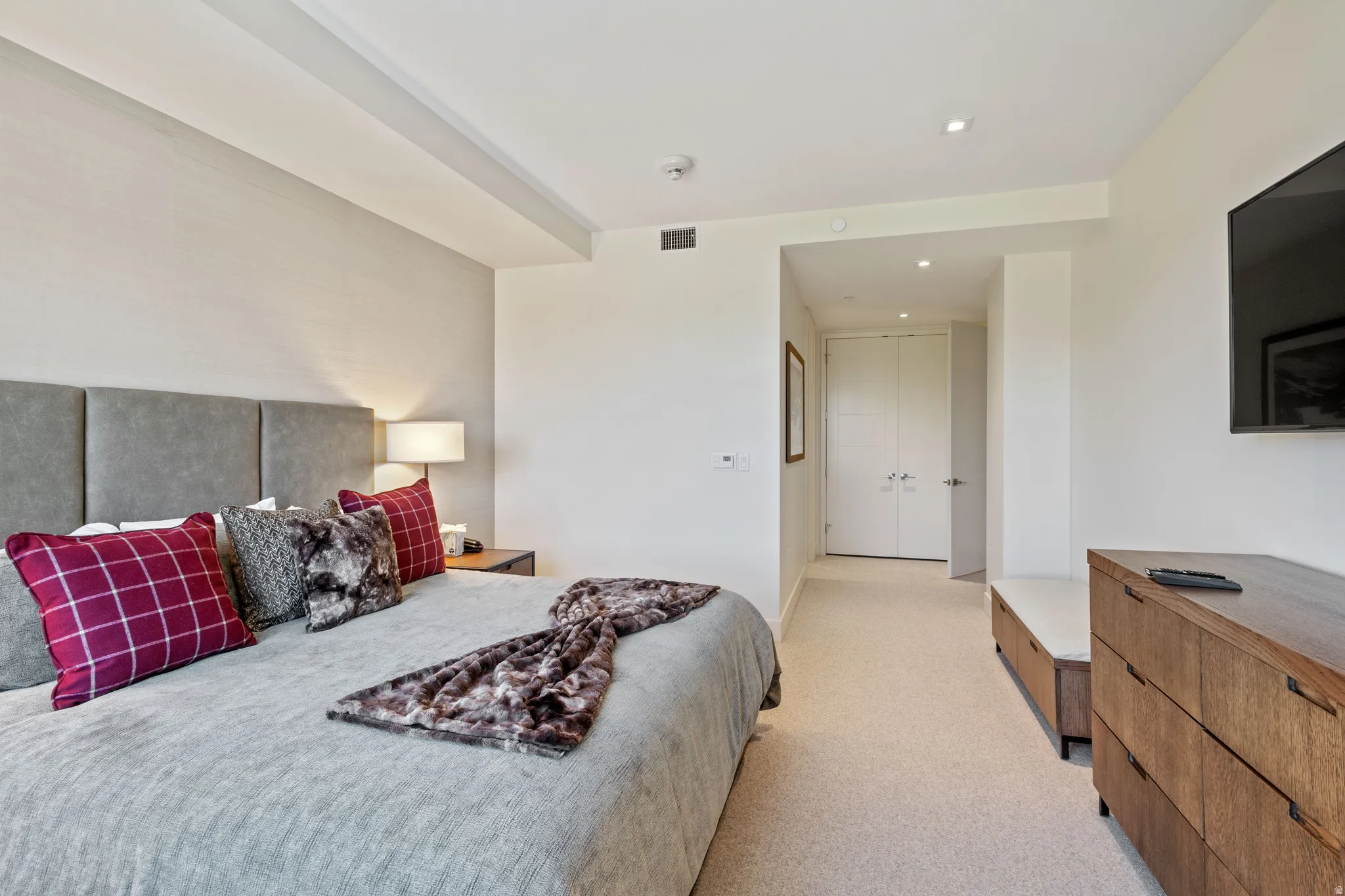 Bedroom featuring light colored carpet and recessed lighting