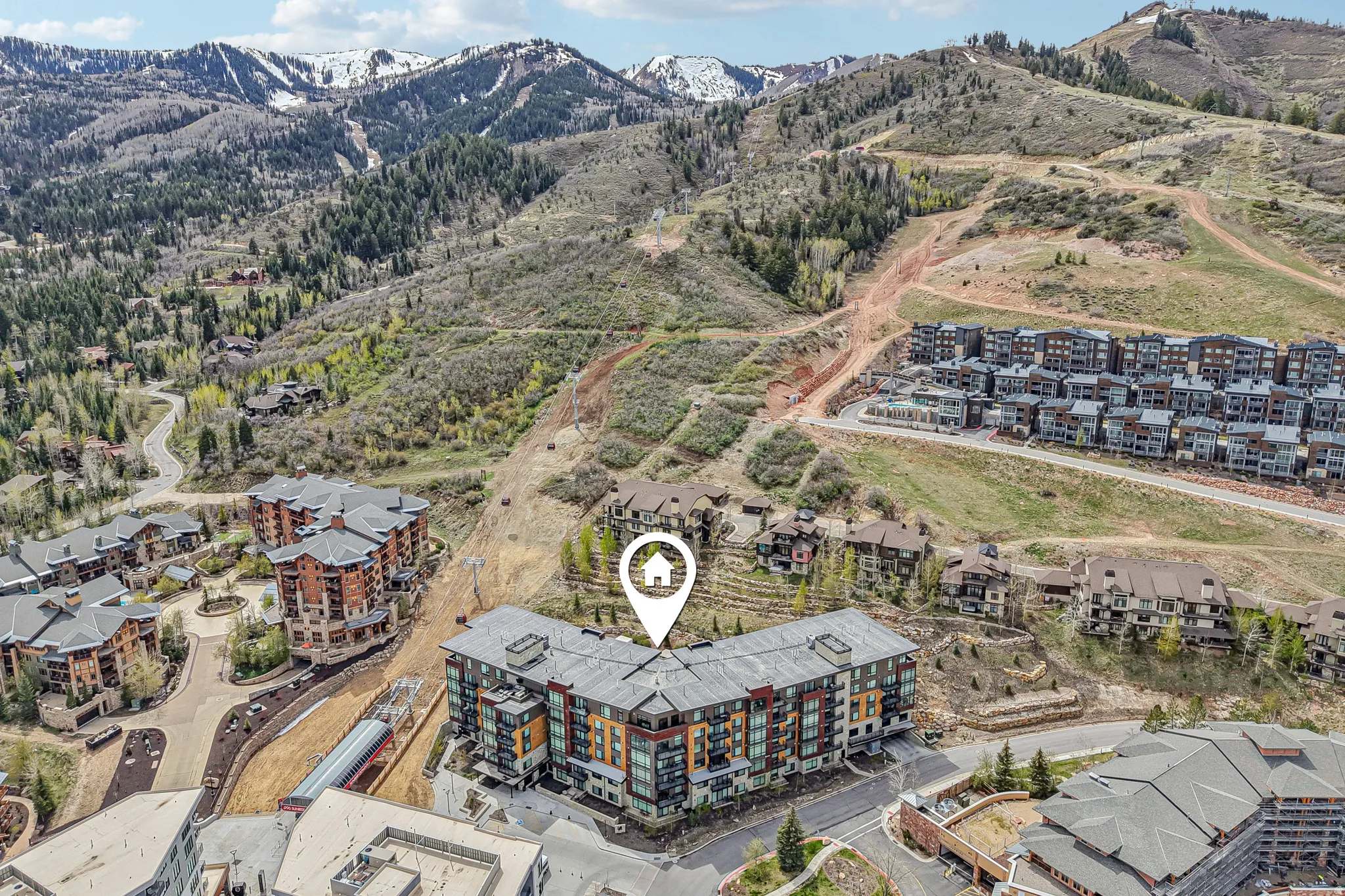 Drone / aerial view of a mountain backdrop