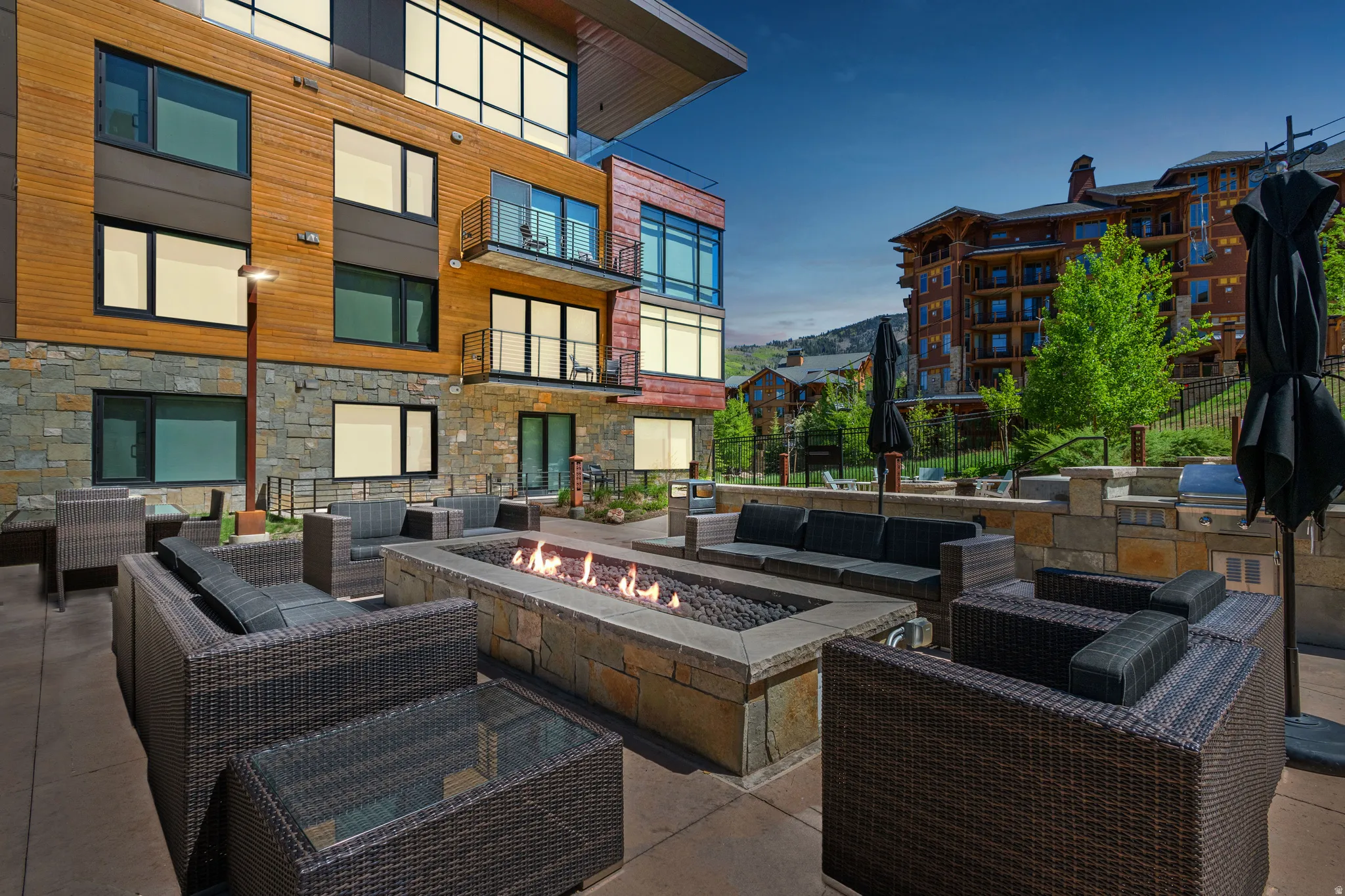 Patio / terrace featuring an outdoor living space with a fire pit, a patio, and grilling area