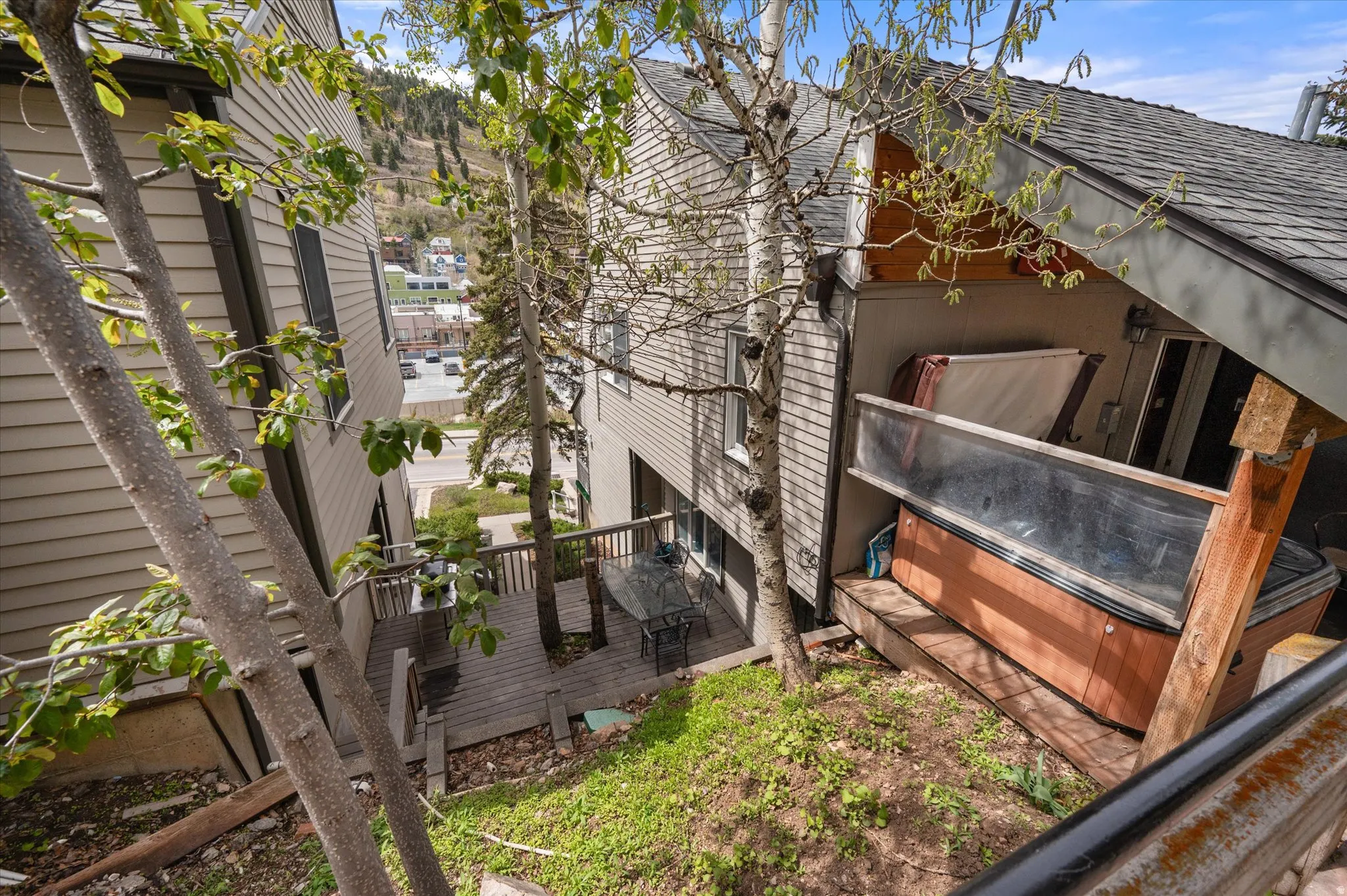 View of home's exterior from upper walkway.