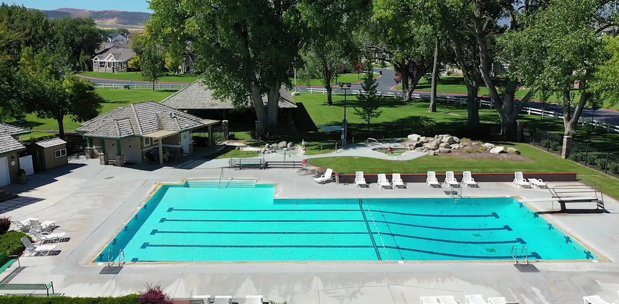 Community hot springs pool with a patio area