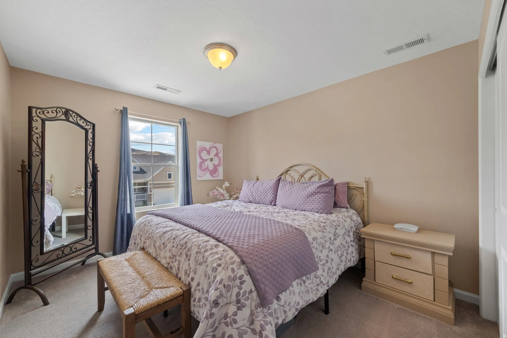 Bedroom featuring carpet floors