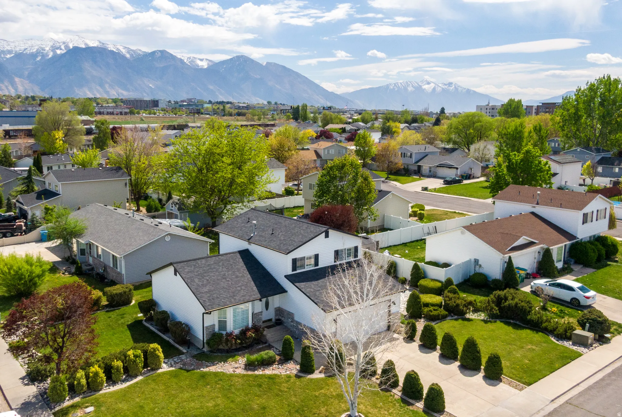 Aerial view of residential area with a mountainous background