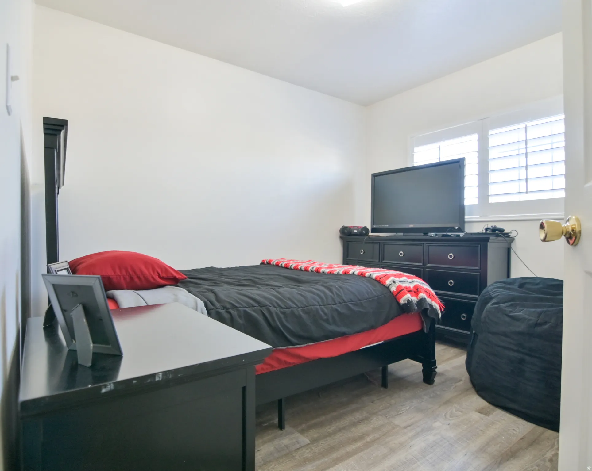 Bedroom with light wood-style flooring