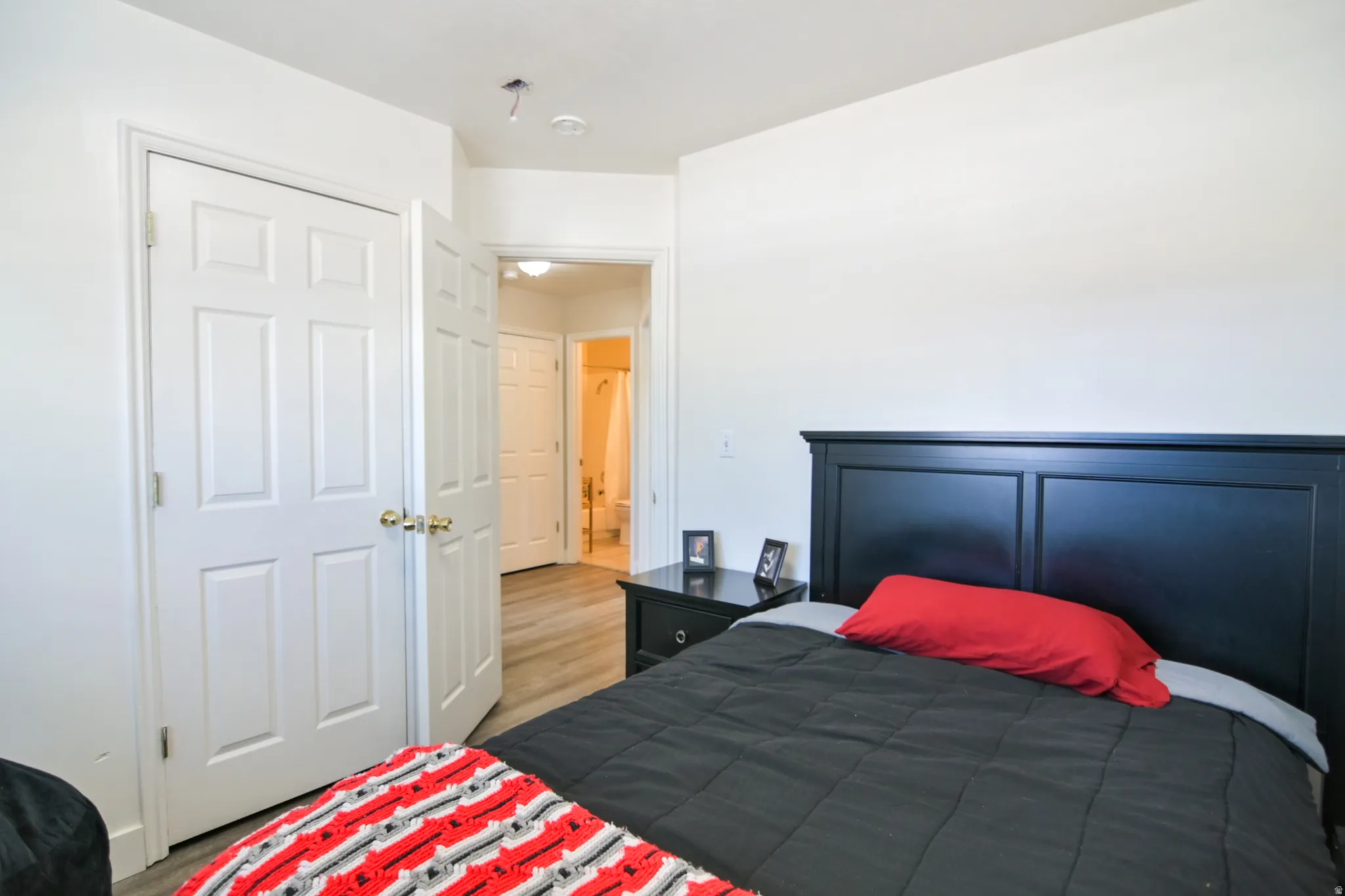 Bedroom featuring light wood-type flooring