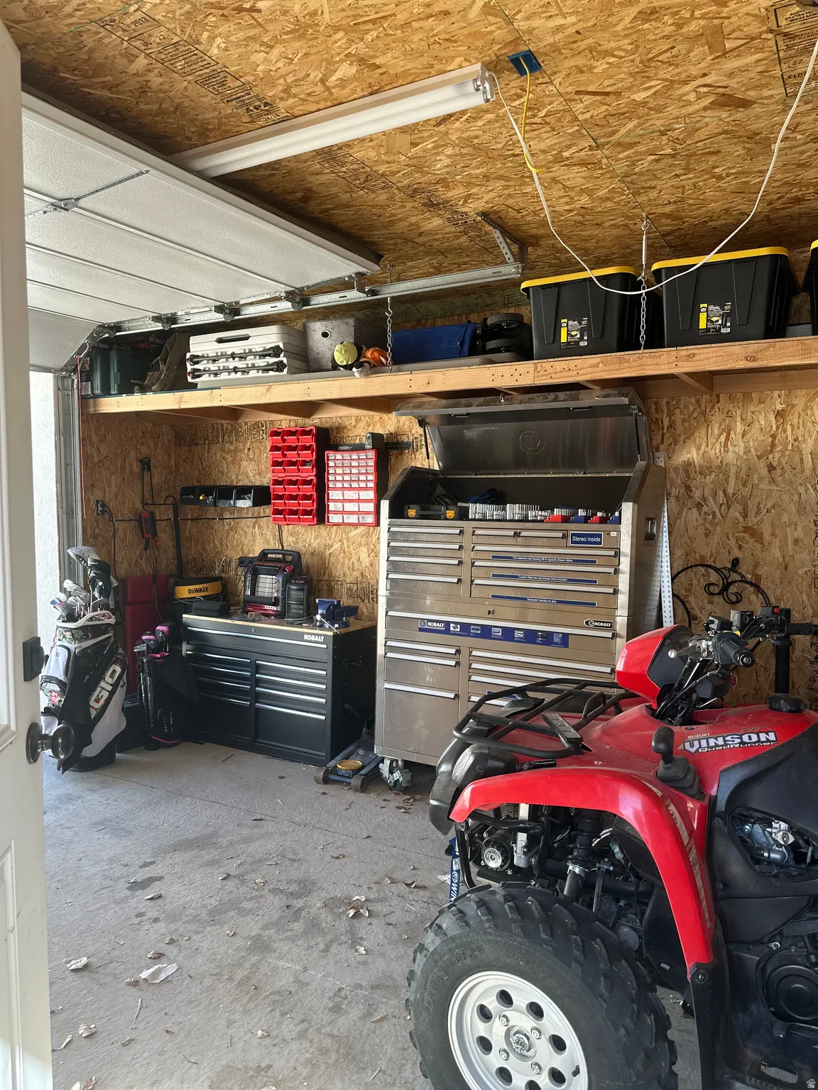Garage featuring a workshop area