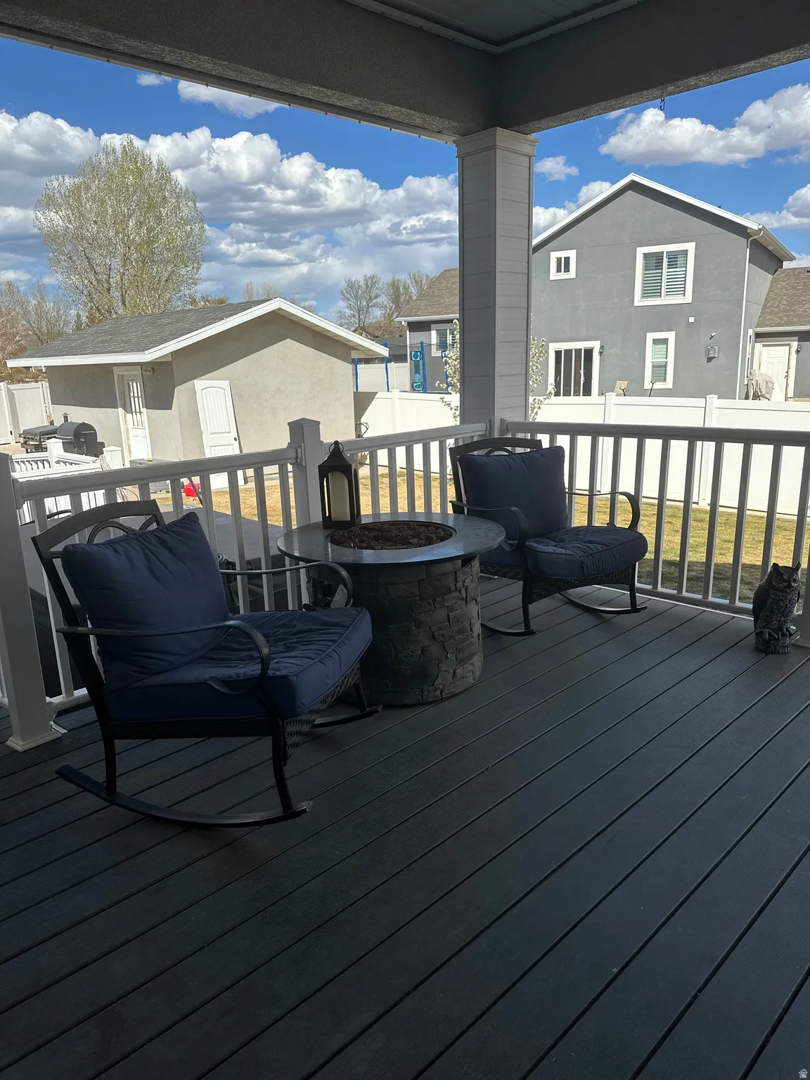 Wooden terrace with a fire pit