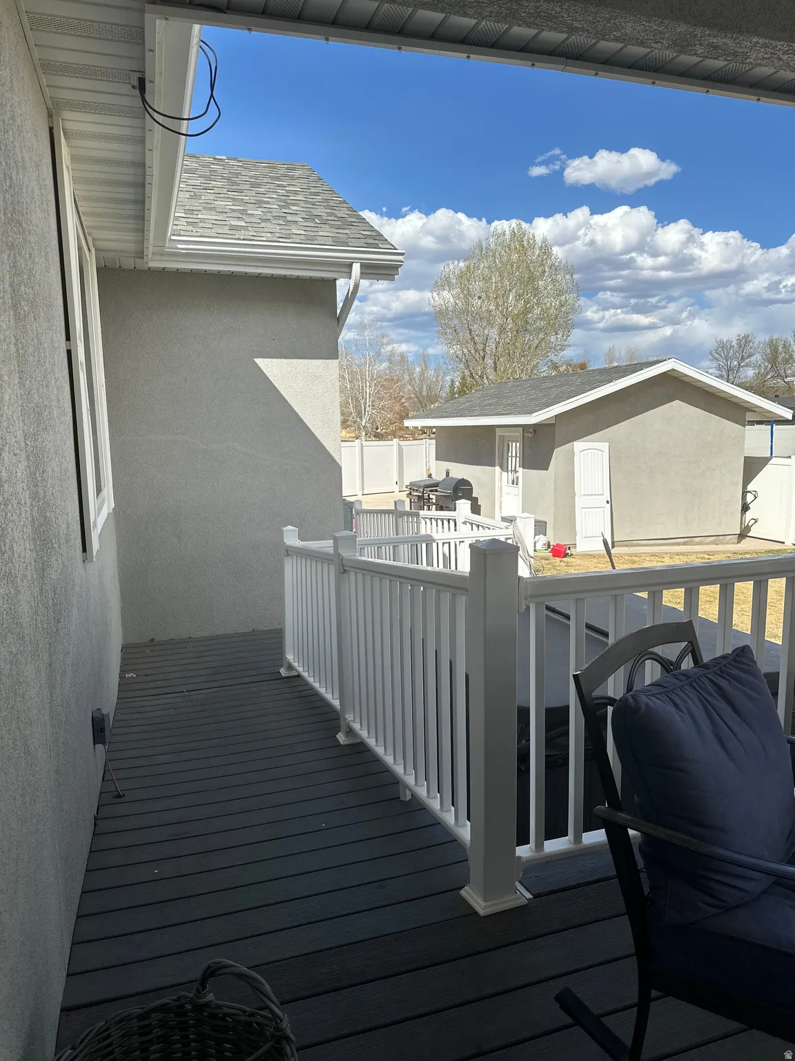Deck featuring an outdoor structure