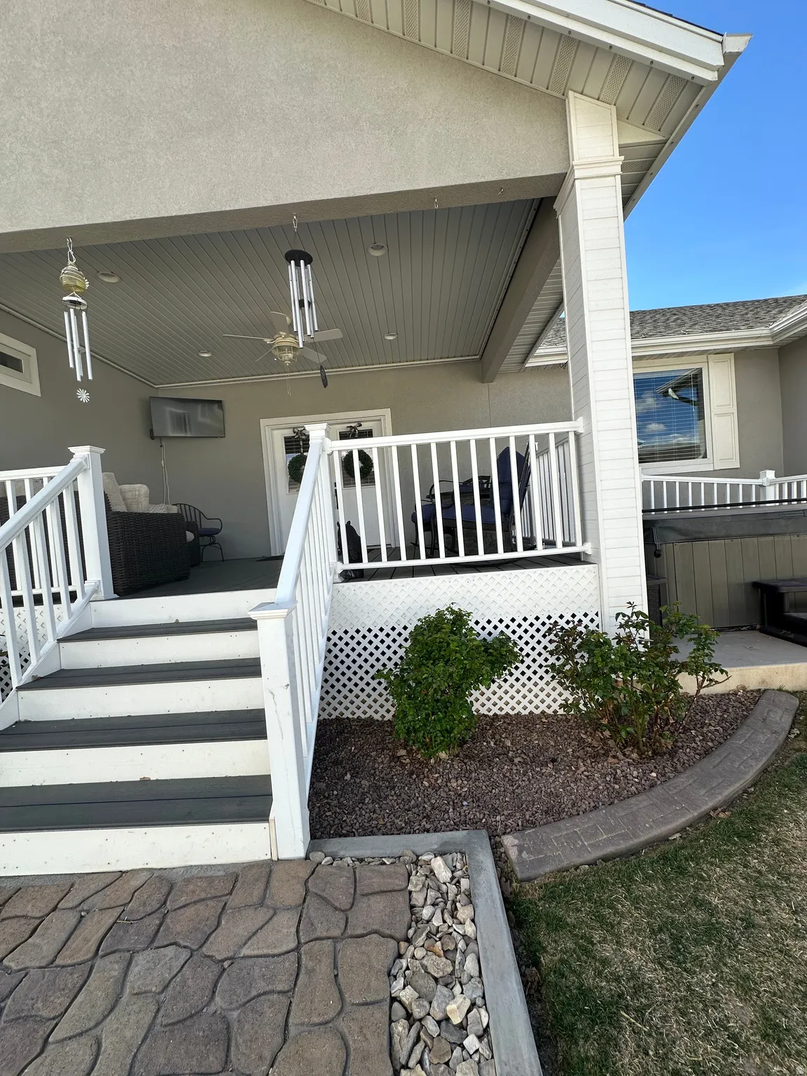 Property entrance featuring stucco siding
